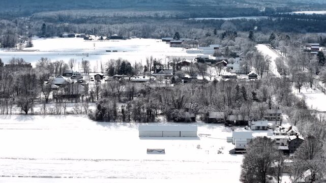 Route 9 Hadley farm fields and roadway, panoramic aerial tracking right in winter