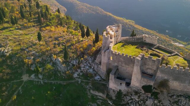 Stjepan Grad Castle Fortress in Blagaj, Bosnia - 4K aerial drone view during Golden Hour