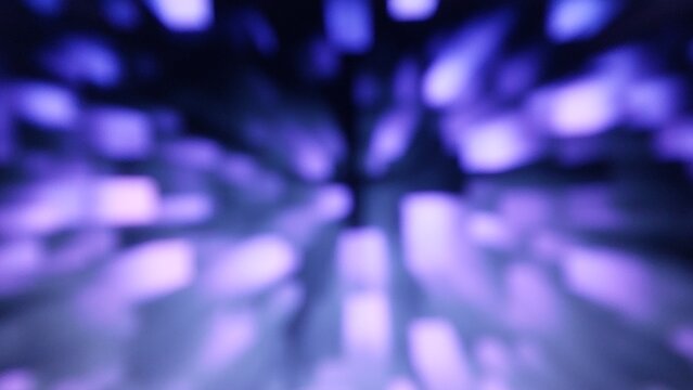Vibrant abstract purple light bokeh with motion blur effects for creative digital technology background designs