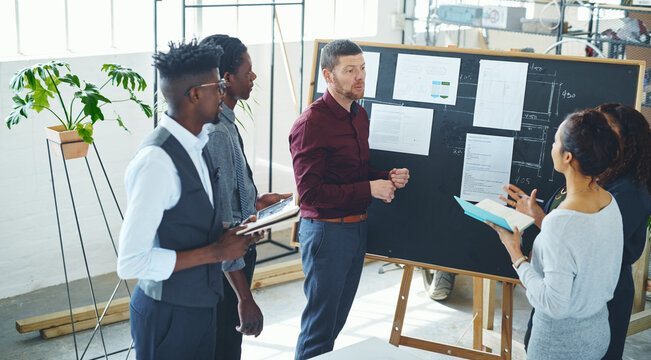 Training, question or team in office with board, insight or advice in interior design project. Collaboration, people or architects in agency with coaching, guidance or feedback on property report.