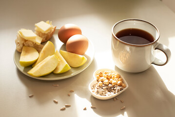 Healthy Breakfast with Boiled Eggs, Apples and Black Coffee