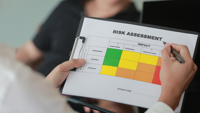 Professional analyzing risk assessment documentation on clipboard carefully checking serious strategy plan