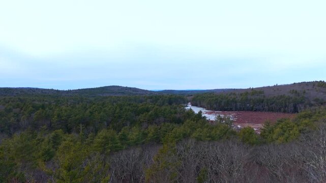 Aerial establishing overview of Bright Water Bog, Shutesbury Massachusetts