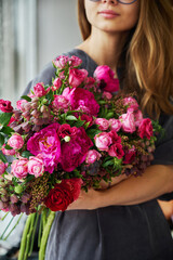 Vibrant, fresh red rose flower bouquet arrangement