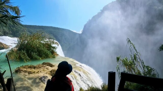 Explore Tamul Waterfall in Huasteca Potosina, San Luis Potosi, Mexico on a sunny day with vibrant nature