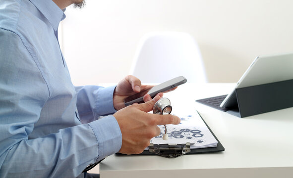 Doctor Using Smartphone and Stethoscope for Digital Healthcare Consultation