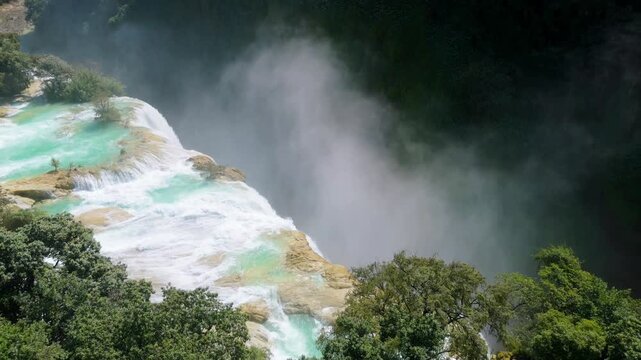 Visit Cascada de Tamul in Huasteca Potosina and explore its natural beauty and lush surroundings