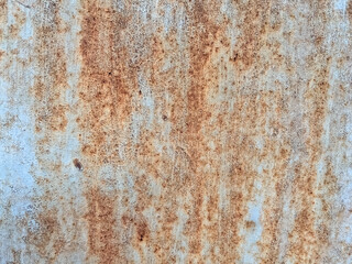 Fototapeta premium Rusted Metal Panel with Flaking Paint Texture