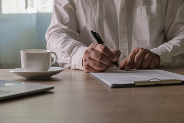 Contract signing contract concept, insurance and financial services, Lawyer, broker or HR manager signing a business agreement on office, representing client consent and authorization.