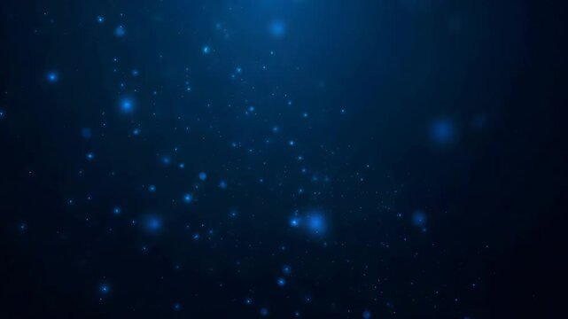 Abstract blue background with particles in motion featuring a dark night sky and deep cosmos nebula with glowing stars and underwater snow animation loop