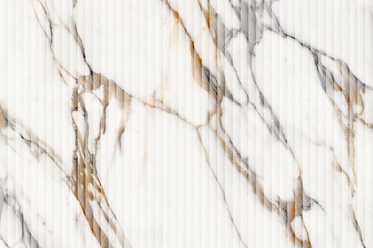 white fluted marble texture with gold and grey veining, seamless ribbed calacatta marble wall panel background.