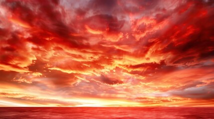 Obraz premium Dramatic Sunset Over the Tranquil Ocean with Fiery Sky and Colorful Clouds Creating a Breathtaking View