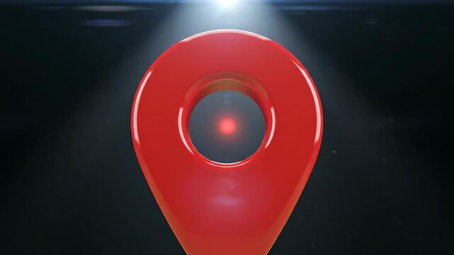 A shiny red location pin is displayed against a vibrant green background in this 3D render.