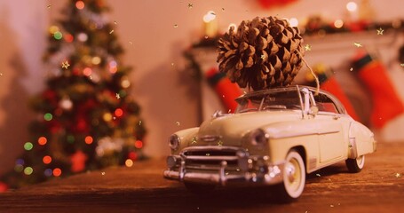 Naklejka premium Displaying cream car carrying pinecone tied with twine on tabletop in living room, mantel and tree