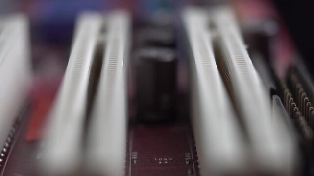 PCI Slots and Electronic Components of Computer Motherboard. Macro Close Up