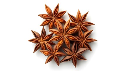 A close-up view of star anise arranged on a white background