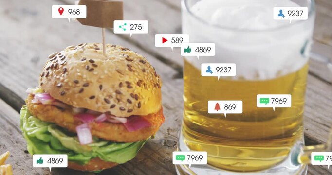 Notifications appearing, gathering around sandwich, beer while camera panning left showing buzz
