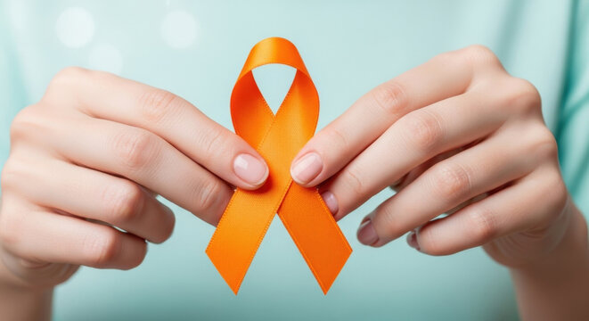 Maio Laranja: hands holding orange awareness ribbon &mdash; ideal for child protection campaign and social advocacy.