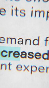 Vertical macro shot of a newspaper article highlighting inflation, representing economic pressure, rising prices, financial uncertainty, and modern business and market challenges.