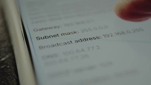 Network configuration details displayed on a mobile phone screen, including Gateway, Subnet mask, Broadcast Address and DNS