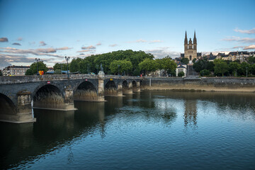 Obraz premium Sunset scenery in beautiful city of Angers in France, with famous chateau and cathedral