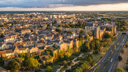 Obraz premium Aerial view with sunset scenery in beautiful city of Angers , with famous chateau and cathedral