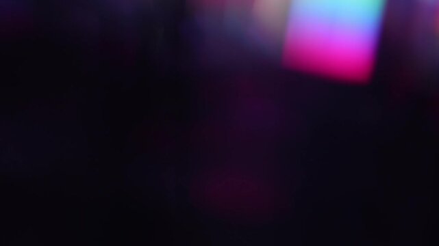 4k Blur colorful rainbow crystal light leaks on black background. Defocused abstract multicolored retro film lens flare bokeh analog photo overlay or screen filter effect. Glow Vintage prism colors