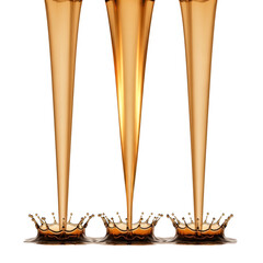 Three streams of golden liquid pouring down and creating crown splashes on a reflective surface