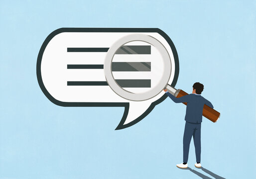 Man holding magnifying glass over text in large speech bubble on blue background