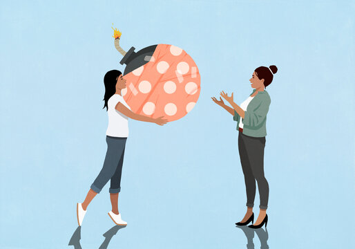 Girl giving wrapped bomb to surprised mother on blue background
