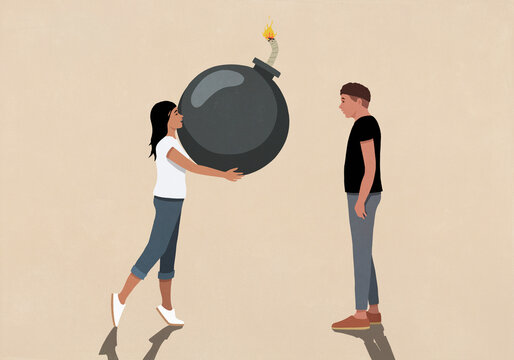 Woman handing bomb to man on beige background