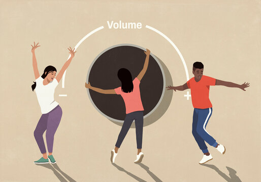 Carefree young friends dancing to music and turning large volume knob