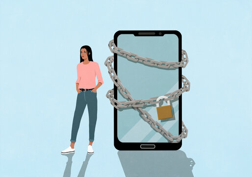 Suspicious young woman standing next to large padlocked smart phone