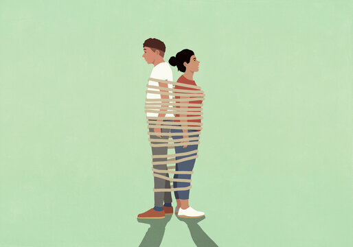 Couple strapped back to back with rope against green background