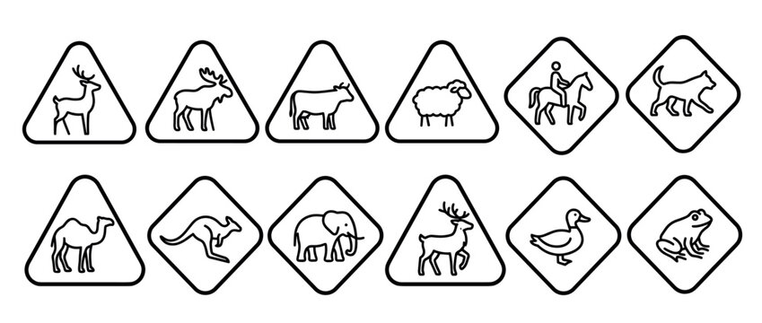 Collection of black line art animal warning road signs featuring various wildlife and domestic creatures like deer, moose, cow, and elephant in a minimalist icon set for traffic safety