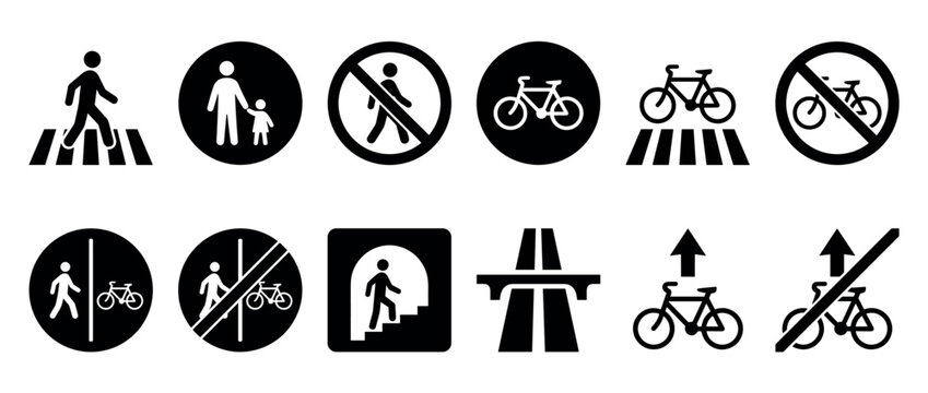 Collection of black and white traffic signs for pedestrians and cyclists in a minimalist vector style, including crosswalk, bicycle lane, and prohibition symbols for road safety