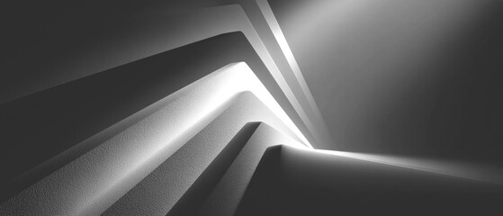 Abstract grayscale artwork featuring sharp angles and linear gradients against a dark backdrop