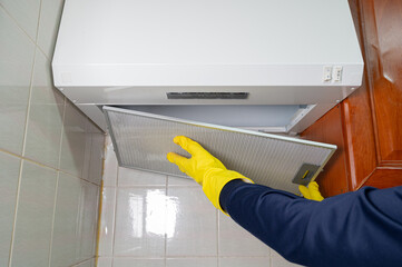 Kitchen range hood filter replacement and cleaning