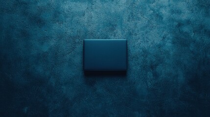 A dark blue background with a square object in the center.