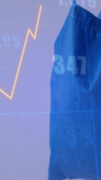 Vertical video: Chart starting, blue bag hanging right, lines rising then dipping showing Jan-Apr