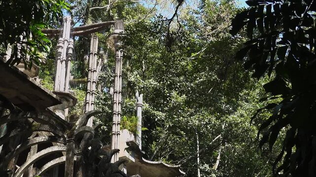 Explore Castillo de Edward James in Xilitla, San Luis Potosi, Mexico during a sunny day surrounded by lush greenery and unique architecture