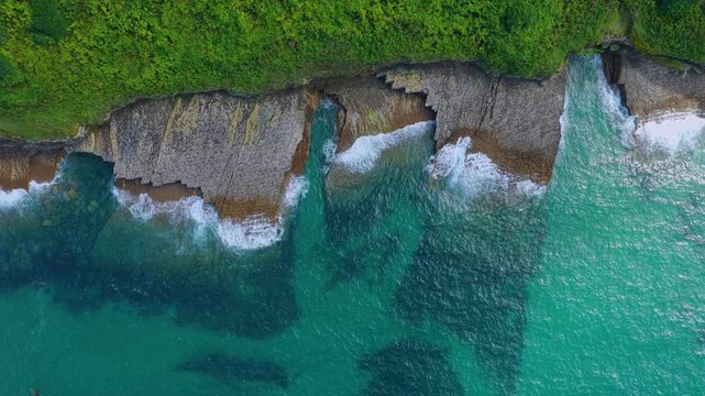 Aerial view from a drone of the coastline near Punta Ballota in the municipality of Suances. Cantabrian Sea. Cantabria. Spain. Europe