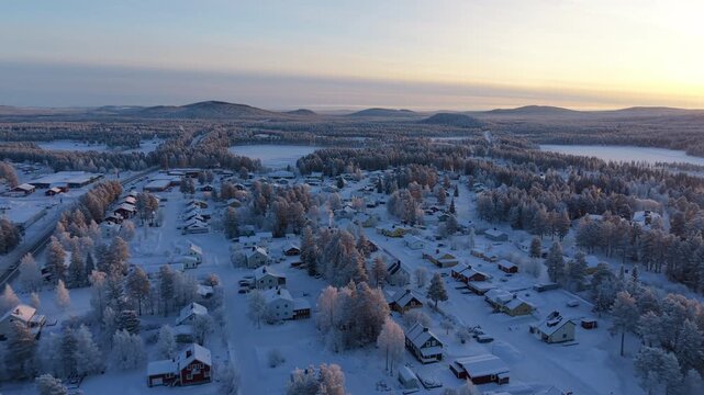 Snowy Village in Lapland - Golden Hour Sunset Sky AERIAL