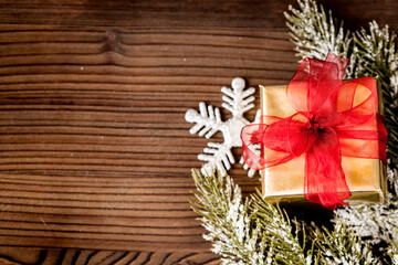 packaging christmas gifts in boxes on wooden background top view