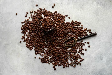 Fotobehang Natuur Park Flat lay of coffee beans and a cup on stone background, top view. Making coffee concept  © 9dreamstudio