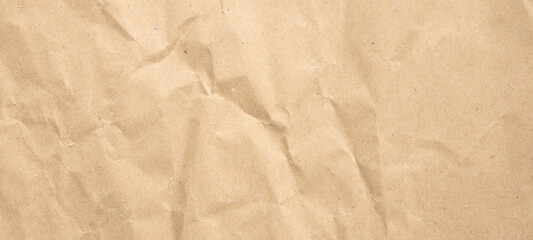 Abstract crumpled and creased recycle brown paper texture background