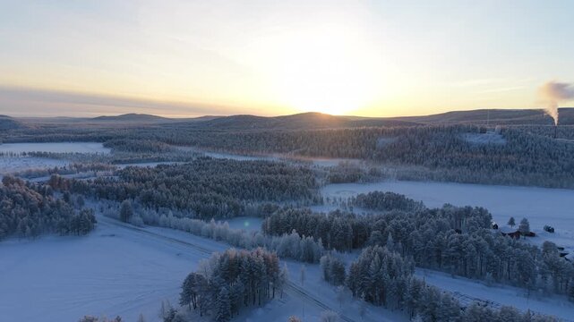 Lappish Winter Landscape with Setting Sun - Aerial Dolly Out
