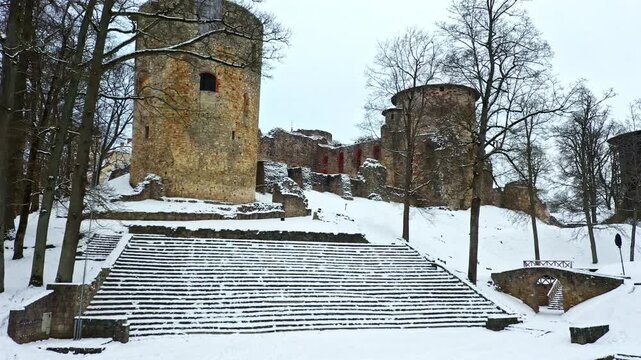 Cesis Castle ruins covered in snow, historic medieval fortifications in Latvia