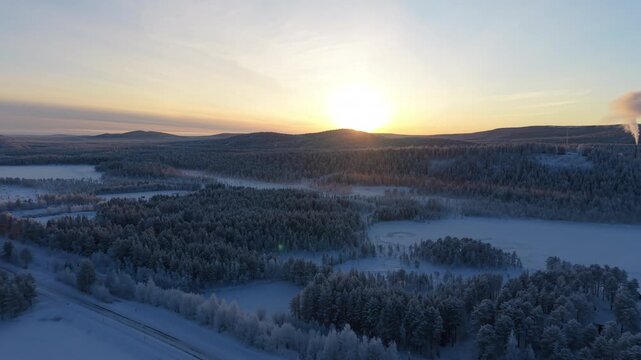 Sun Setting Above Snowy Polar Winter Landscape - Aerial Dolly In