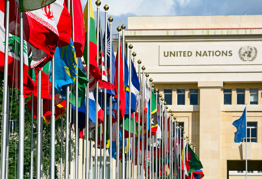 Geneva, Switzerland, Europe : Palace of Nations, national flags of the member states  in foreground, European Headquarters of United Nations, United Nations Office at Geneva (UNOG), Place des Nations